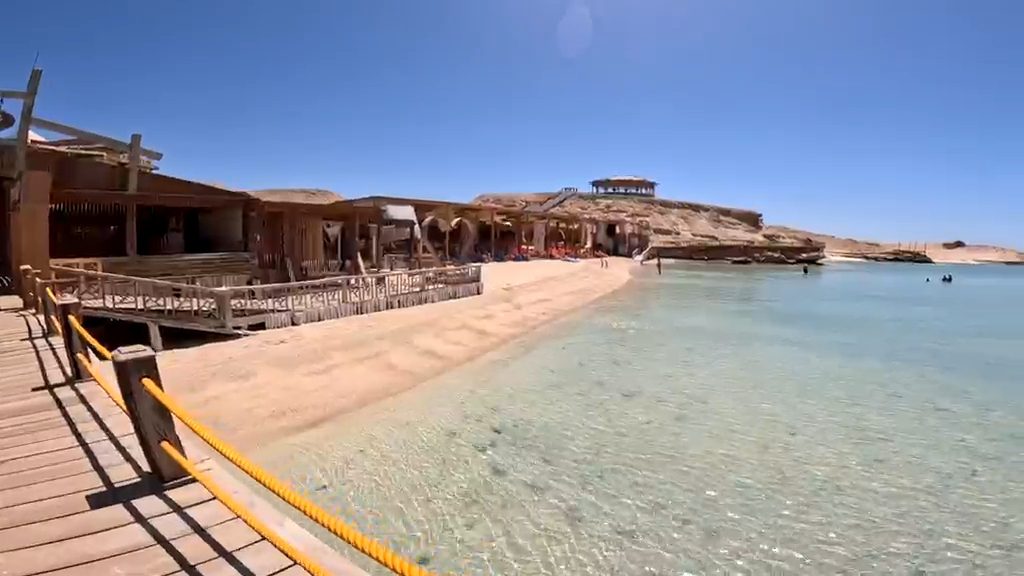 Sandy beach and crystal-clear water at Magawish Island, Hurghada