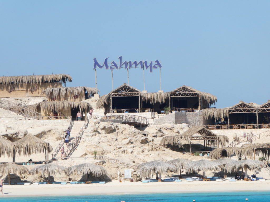 White sandy beach and sun umbrellas on Mahmya Island, Hurghada