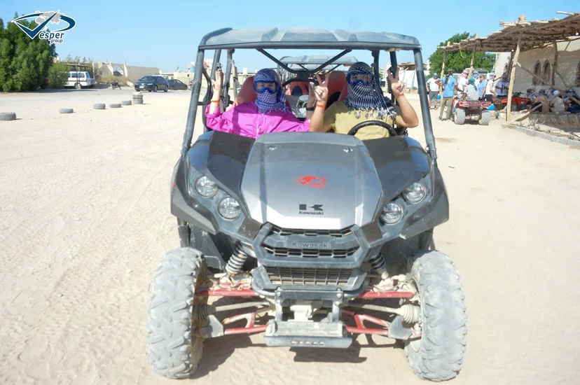 Guests driving a dune buggy in the Hurghada desert