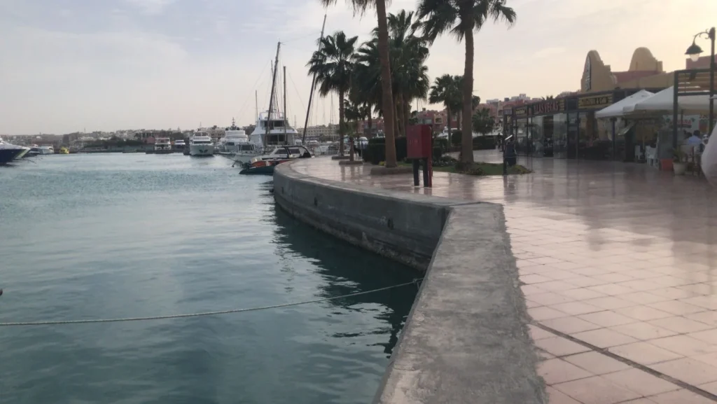 Hurghada Marina waterfront with boats and palm trees